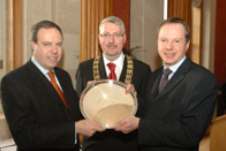 Economy Minister Nigel Dodds pictured with John Fowler, Chairman of the Belfast Branch BCS, presenting the BCS annual award for contribution to the IT industry to David Mawhinney, Managing Director of ICS Computing Ltd