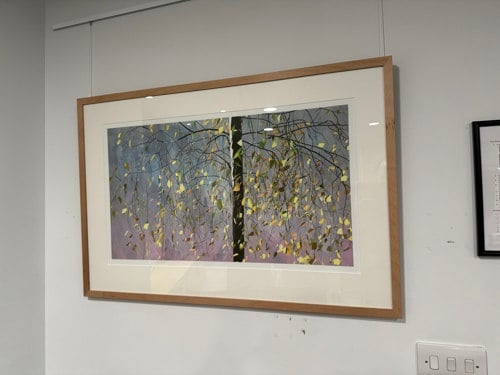 An image of Peter Hardie's artwork featuring a tree with green and gold leaves on a blue and mauve background