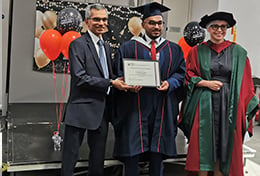 Mohamed Altaf, Chair of the Branch, presenting the certificate and prize to Abbasali Shabir Nasser