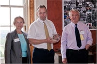 Elizabeth Sparrow and Paul Evans presenting the ITPOY Award to Barry Lowry