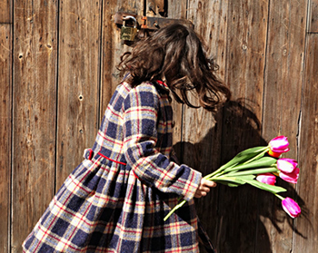 Girl in a tartan coat