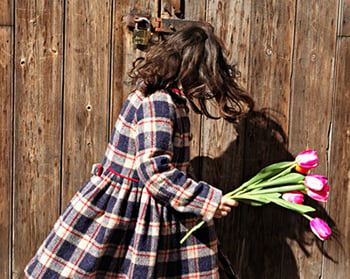 Girl in a tartan coat